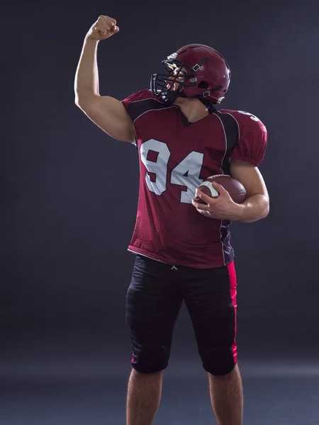 Jogador de futebol americano comemorando touchdown — Fotografia de Stock