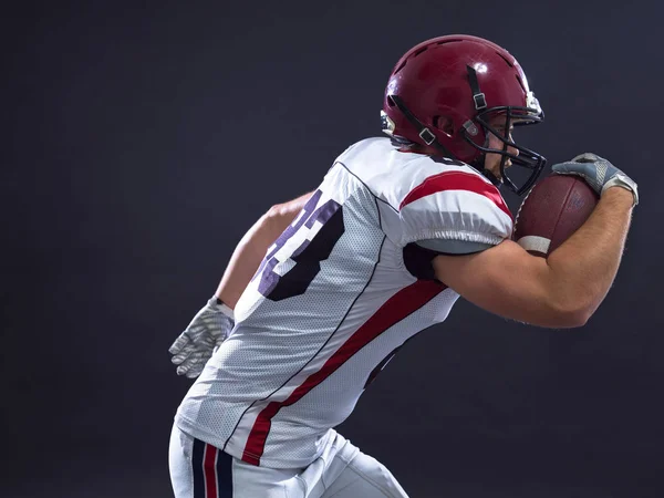 stock image American football Player running with the ball