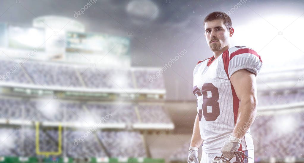 American Football Player isolated on big modern stadium field