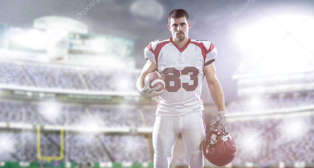 American Football Player isolated on big modern stadium field