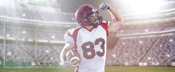 Jugador de fútbol americano celebrando touchdown — Foto de Stock