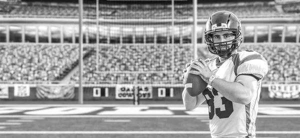 american football player throwing ball