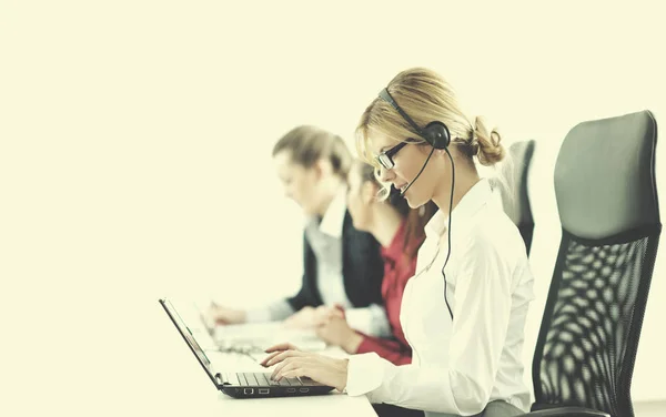 Business woman group with headphones — Stock Photo, Image