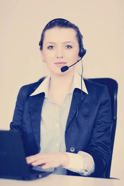 Business woman with headphone — Stock Photo, Image