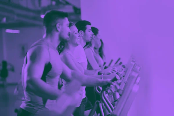 Group of people running on treadmills — Stock Photo, Image