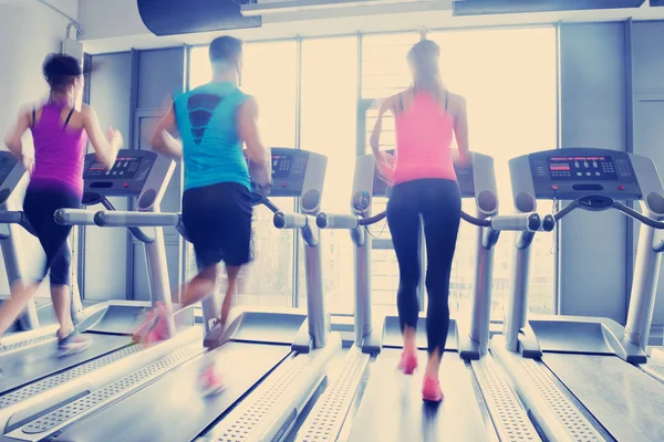 Group of people running on treadmills — Stock Photo, Image