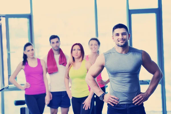Group of people exercising at the gym — Stock Photo, Image