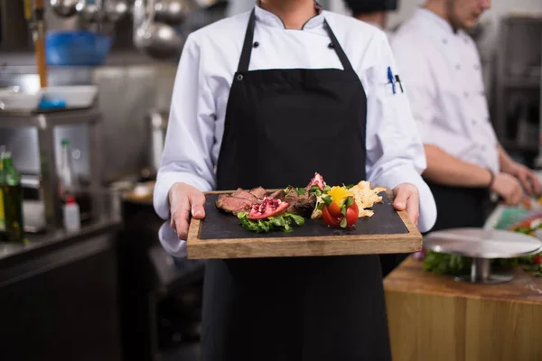 Female Chef Hotel Restaurant Kitchen Holding Grilled Beef Steak Plate — Stock Photo, Image