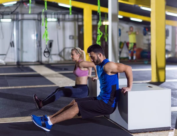 Athletes working out their arms — Stock Photo, Image