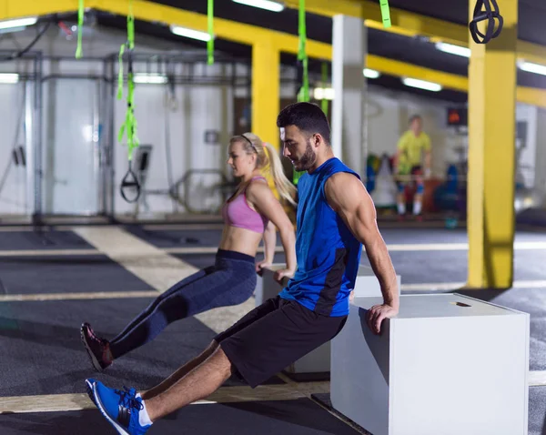 Athletes working out their arms — Stock Photo, Image