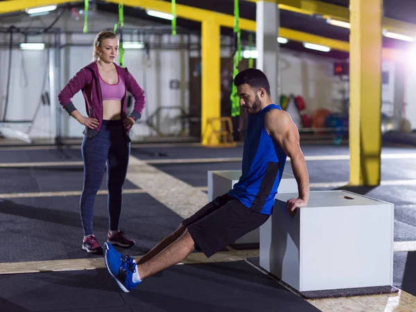 Athletes working out their arms — Stock Photo, Image