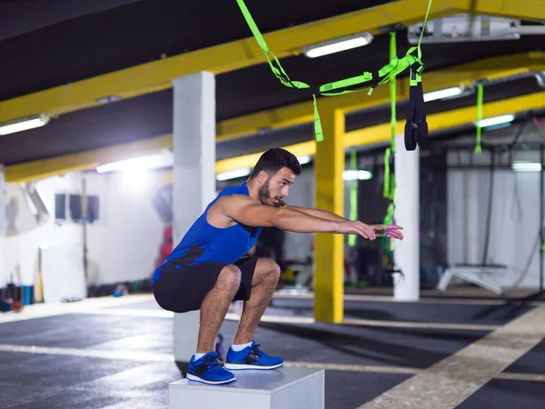 Man working out jumping on fit box — Stock Photo, Image