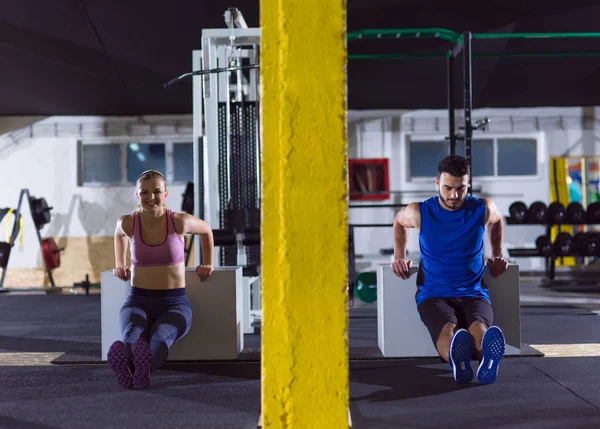 Athletes working out their arms — Stock Photo, Image