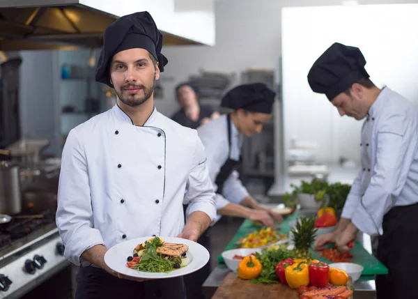 Chef Holding Fried Salmon Fish Fillet Vegetables Dinner Restaurant Kitchen — Stock Photo, Image