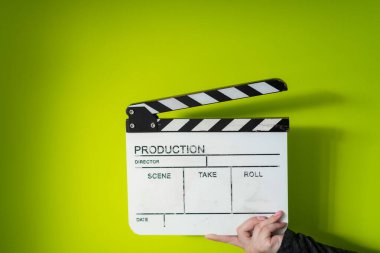 movie clapper on green  background clipart