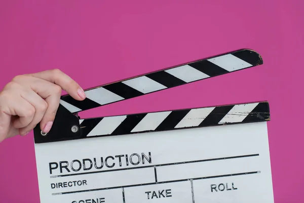 Film tapsoló rózsaszín háttér — Stock Fotó