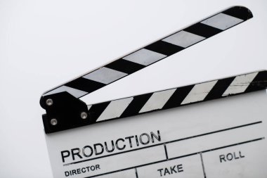 Beyaz arkaplanda film alkışı
