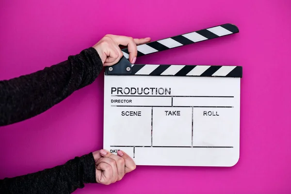 Movie clapper on pink purple violet background — Stock Photo, Image