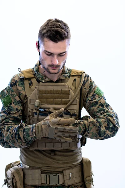 Closeup of soldier hands put protective battle gloves — Stok Foto