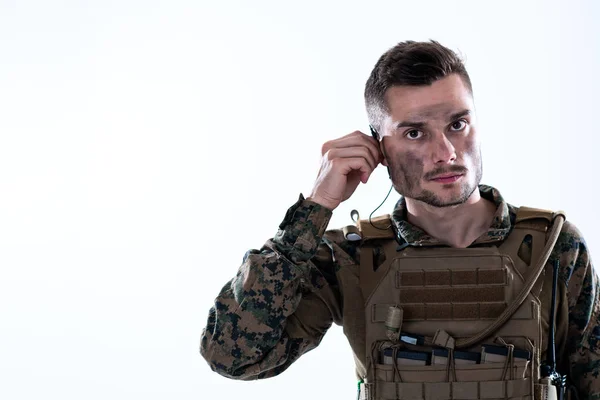 Soldier preparing gear for action — Stock Photo, Image