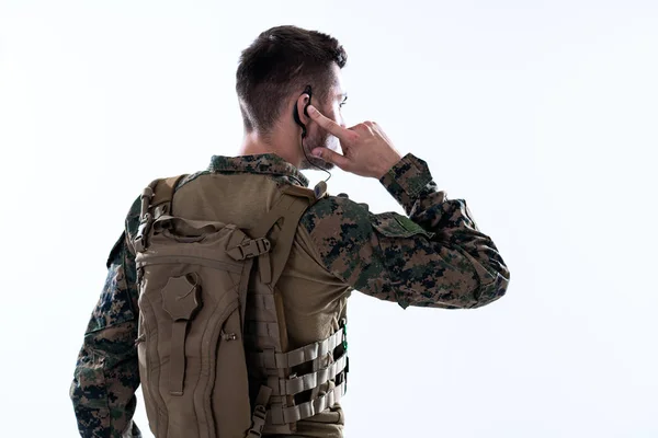 Soldier preparing gear for action and checking communication — Stock Photo, Image