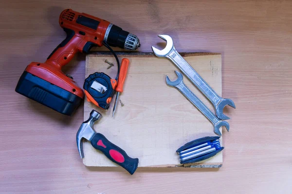 Conjunto Herramientas Trabajo Mano Sobre Fondo Madera Concepto Herramientas Trabajos — Foto de Stock