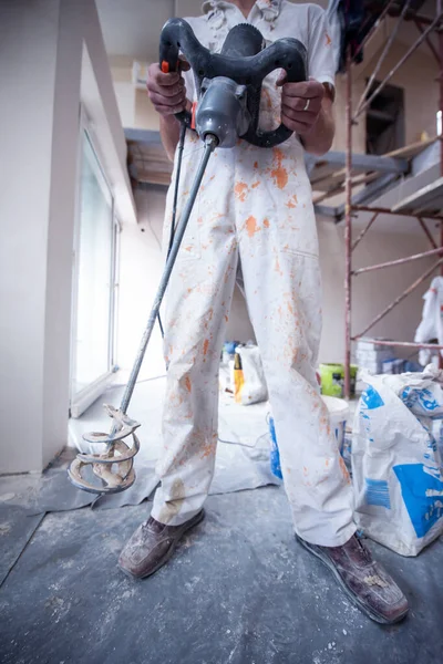 Professional Male Builder Mixing Plaster Bucket Using Electric Mixer New — Stock Photo, Image