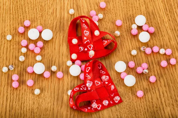 Two hearts with beads — Stock Photo, Image