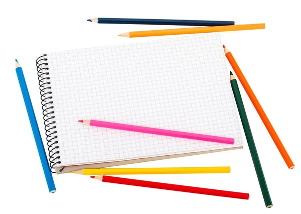 Empty notebook and colour pencils — Stock Photo, Image