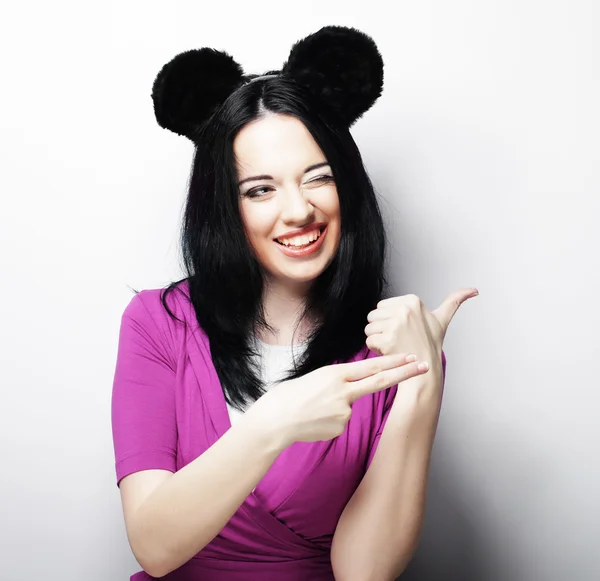 Surprised funny young woman with mouse ears — Stock Photo, Image