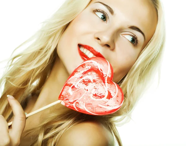 Woman with heart lolly pop Royalty Free Stock Images
