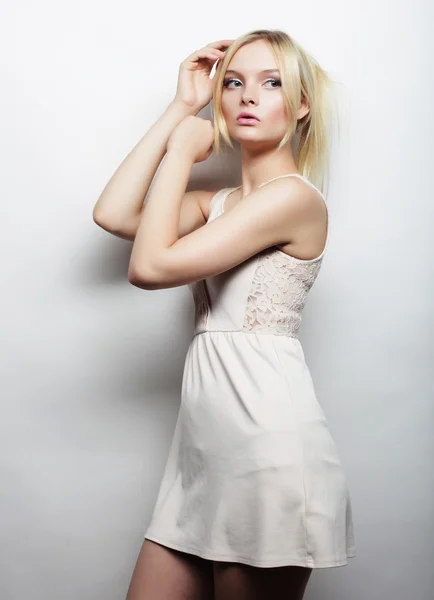 Young magnificent woman in white dress. — Stock Photo, Image