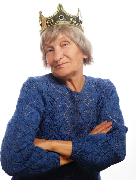 Senior vrouw dragen kroon doen funky actie — Stockfoto
