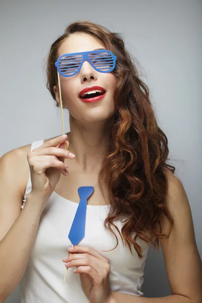 Attractive playful young woman with false glasses — Stock Photo, Image