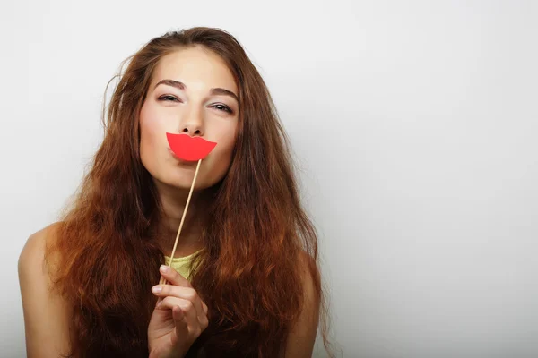 Speelse jonge vrouw klaar voor feest — Stockfoto