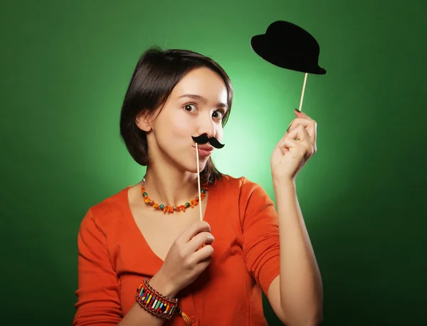 Young happy woman with  fake mustaches — Stock Photo, Image