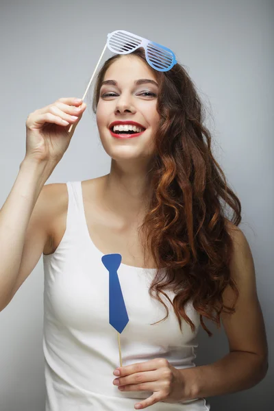 Attractive playful young woman with false glasses — Stock Photo, Image