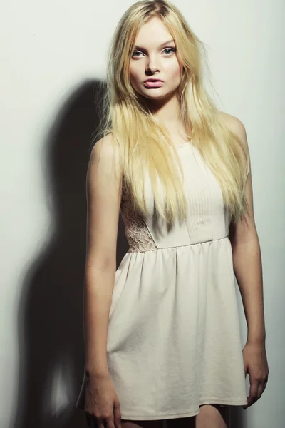 Young magnificent woman in white dress. Stock Image