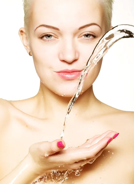 Water falling on the beautiful sensuality woman face with clean — Stock Photo, Image