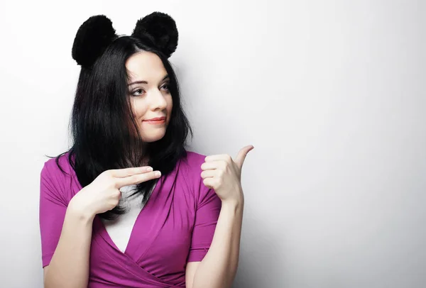 Surprised funny young woman with mouse ears — Stock Photo, Image