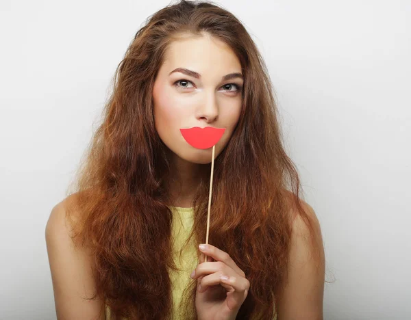 Speelse jonge vrouw klaar voor feest — Stockfoto