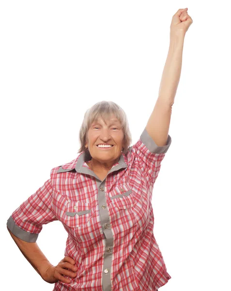 Vrolijke senior vrouw gebaren overwinning op een witte achtergrond — Stockfoto