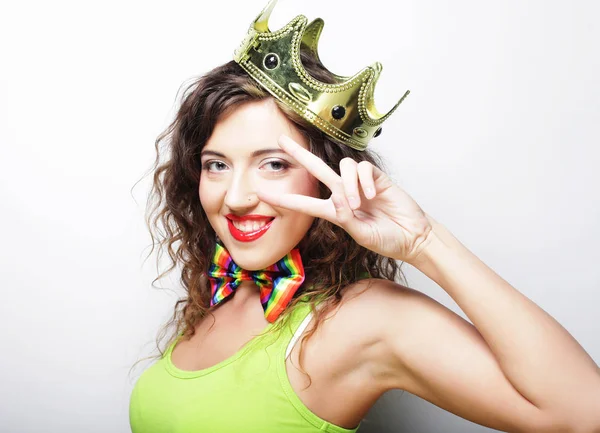 Young lovely woman in crown over white background — Stock Photo, Image