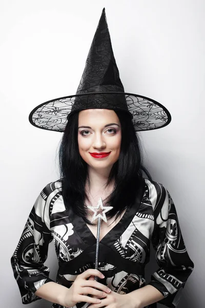 Funny Witch. Young happy woman with canival hat. — Stock Photo, Image