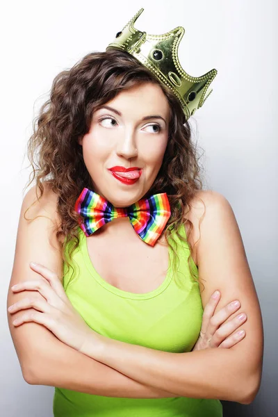 Young lovely woman in crown over white background — Stock Photo, Image