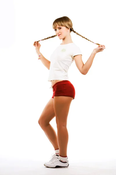 Fiatal sportos nő felett fehér háttér — Stock Fotó