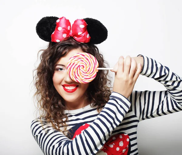 Young woman with mouse ears over white background — Stock Photo, Image