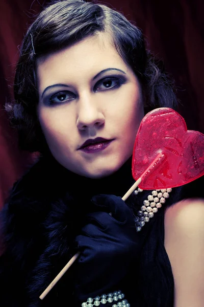 Vintage girl with lollipop — Stock Photo, Image