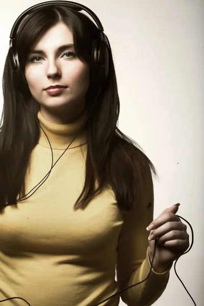 Music, young brunette woman with headphones — Stock Photo, Image