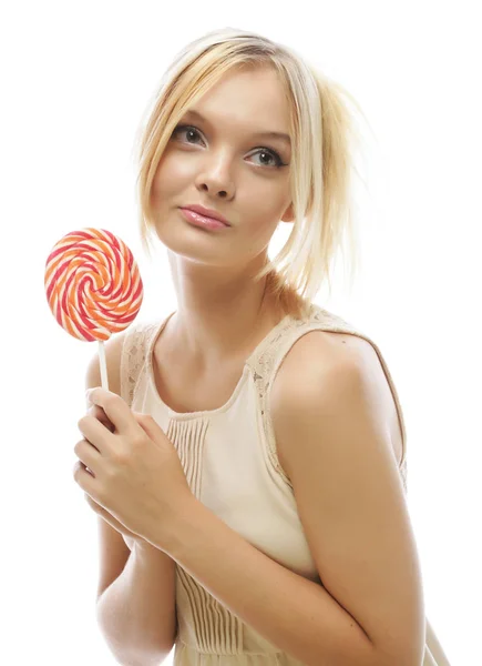 Junge blonde Frau mit Süßigkeiten — Stockfoto